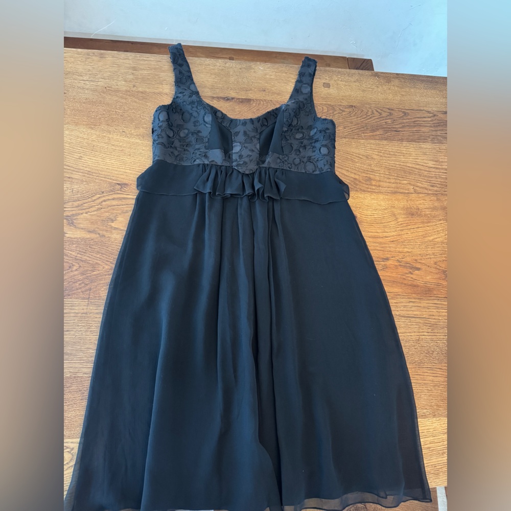 Vintage Carolina Herrera black silk dress. Never worn. Size 12.